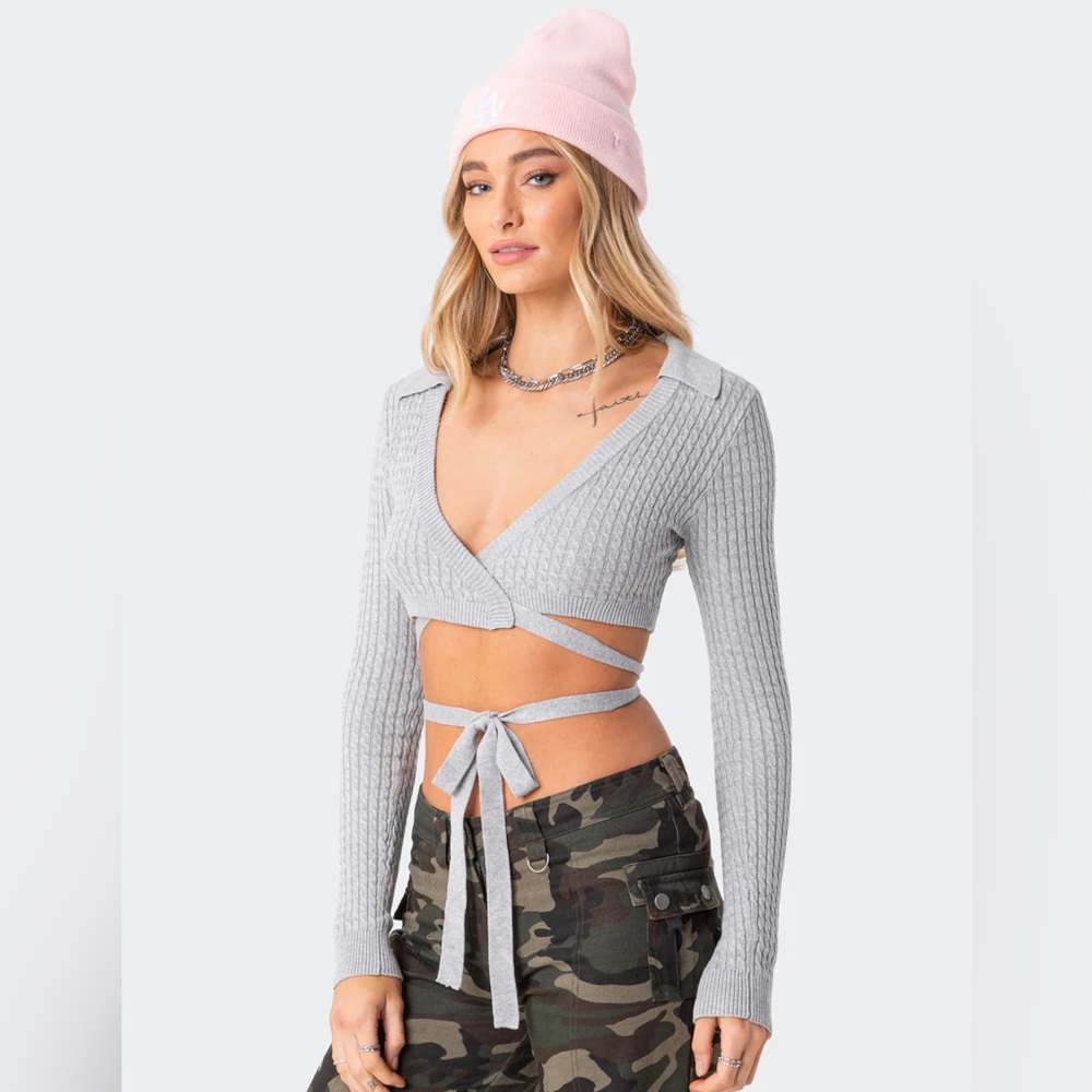 Knitted wrap top, size M.